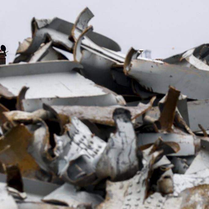 Salvage crews race against the clock to remove massive chunks of fallen Baltimore bridge